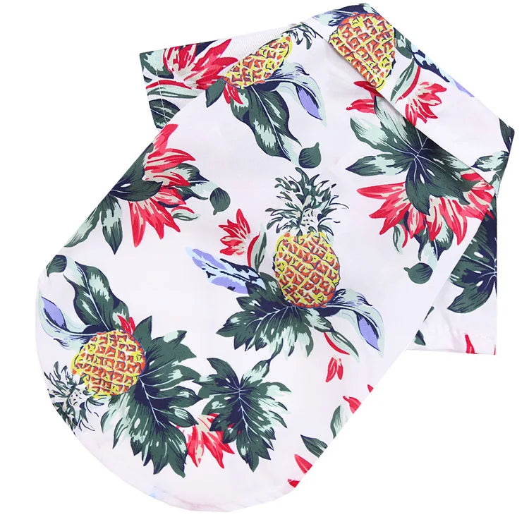 Tropical-themed headband with pineapples and flowers on a white background