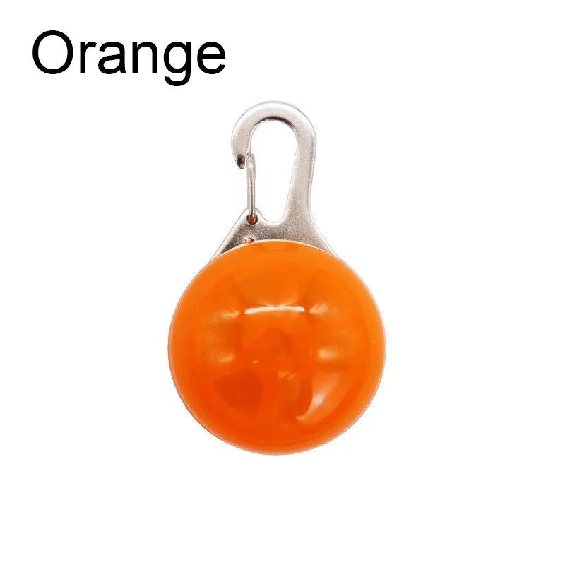 Orange round tag with a metal clip on a white background
