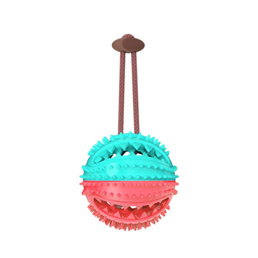 Colorful dog toy with a rope on a white background