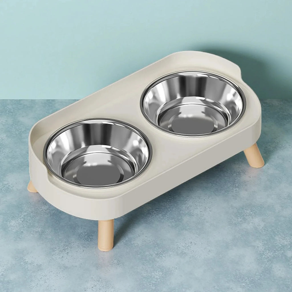 Double pet bowl stand with stainless steel bowls on a light blue background