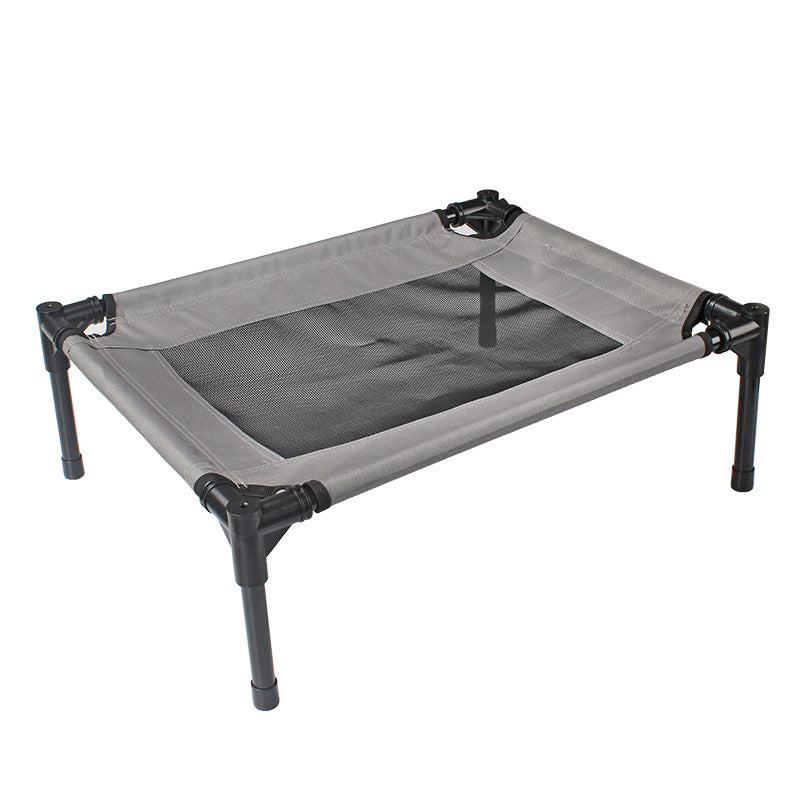 Portable pet cot with gray mesh and black frame on a white background