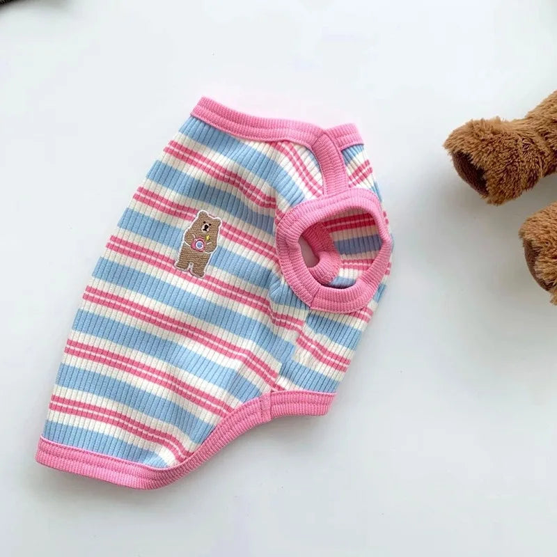 Striped pet shirt with a bear design on a white background