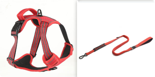 Red and black dog harness and leash set on a white background