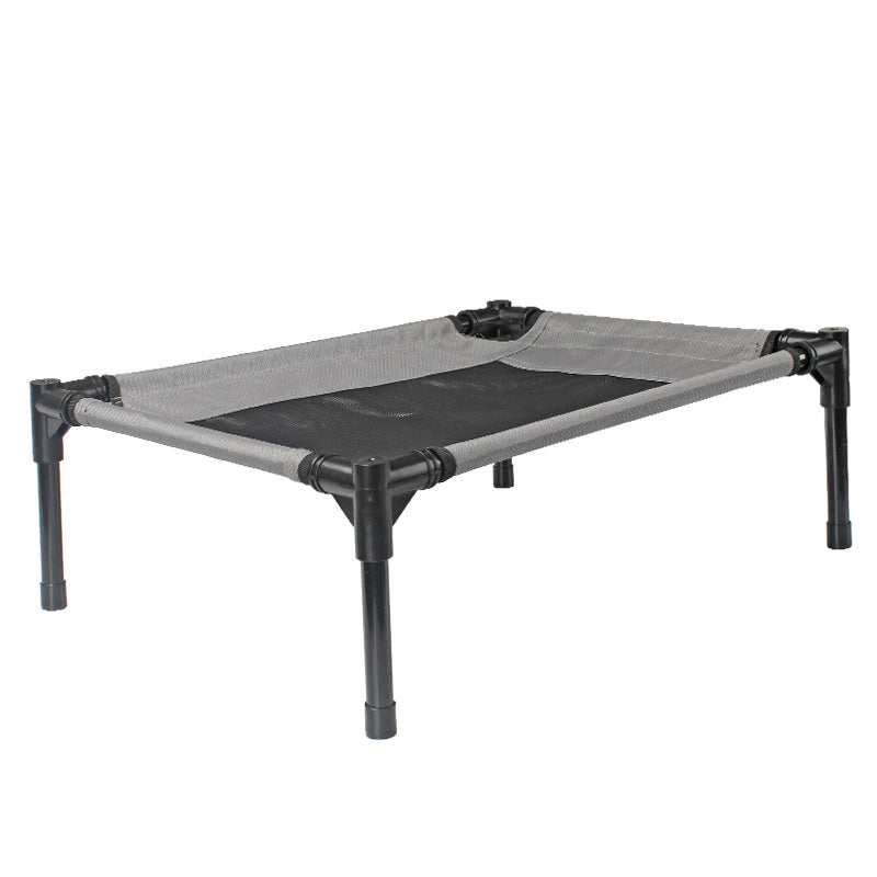 Portable pet cot with black mesh and gray frame on a white background