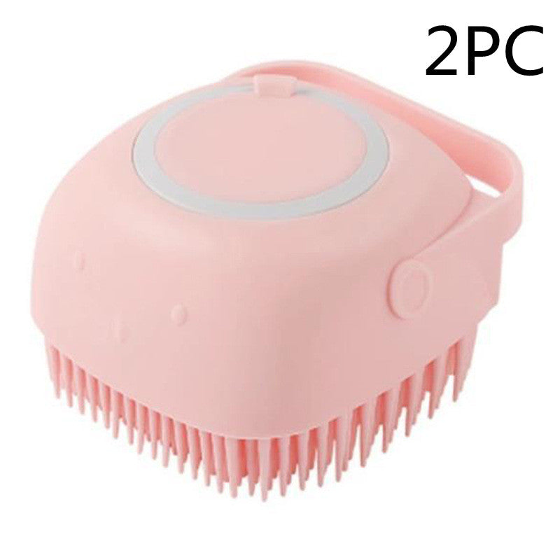 Pink silicone scrubber with bristles on a white background, labeled '2PC'.