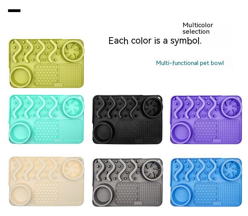 Set of multicolored pet bowls with different textures and designs on a white background.