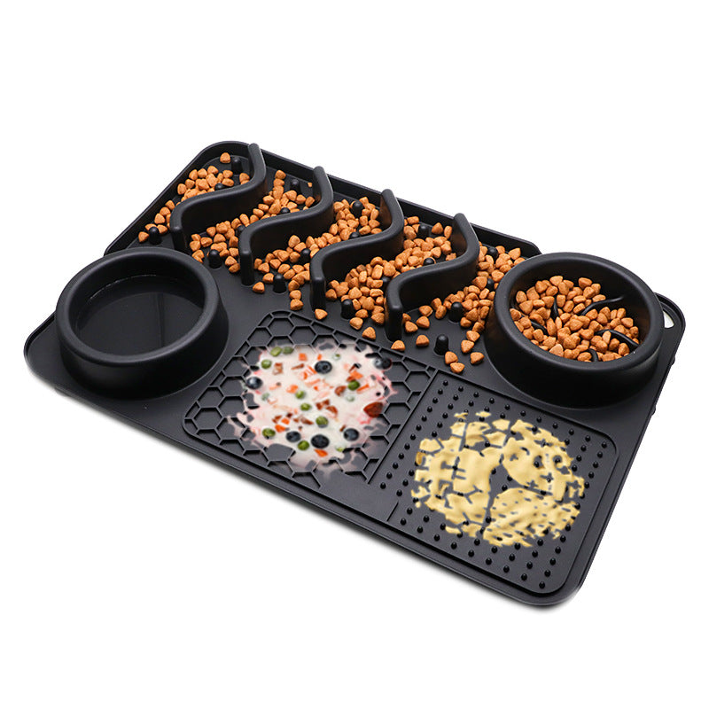 Pet feeding tray with compartments filled with different types of pet food on a white background