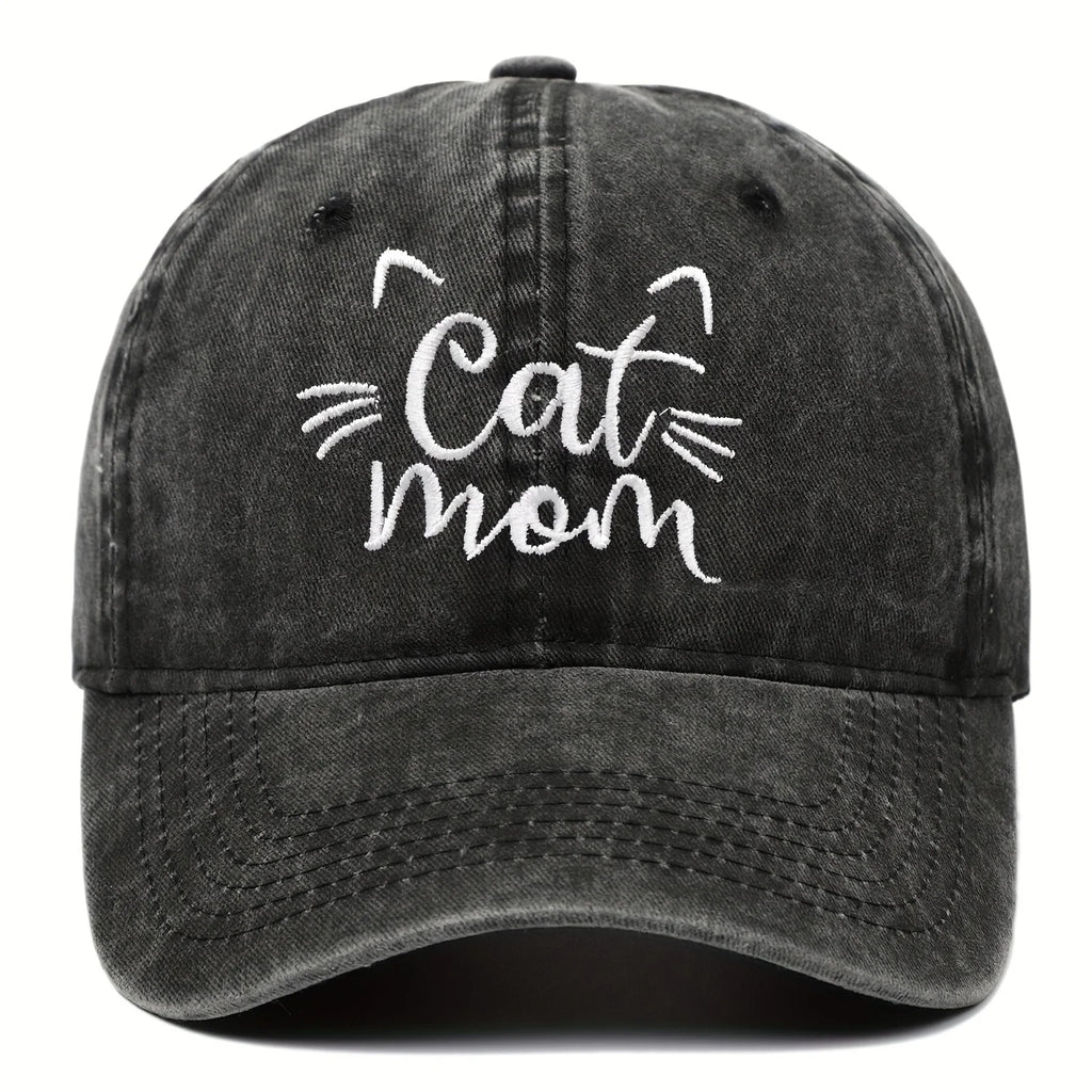 Black cap with 'Cat Mom' text and cat whiskers design on a white background