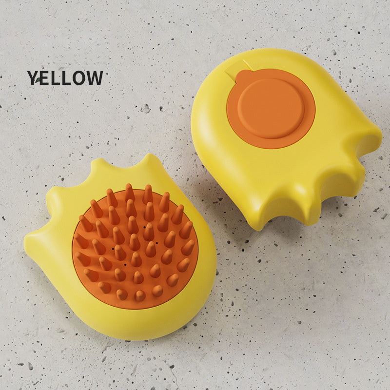 Two yellow and orange pet grooming tools on a textured surface with 'YELLOW' text.
