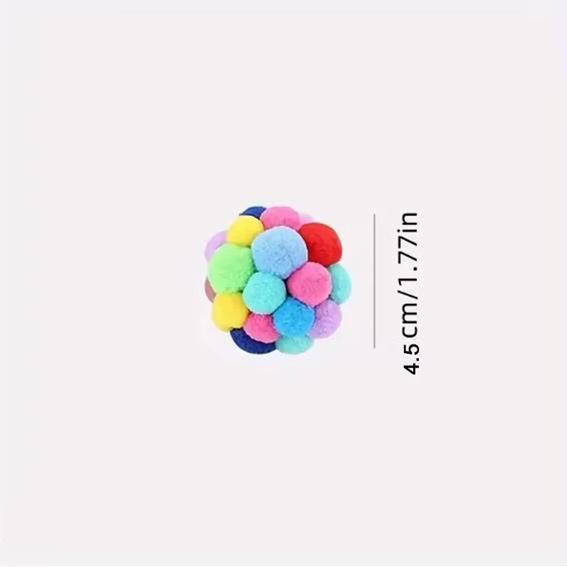 Multicolored pom-pom ball with size measurement on a white background