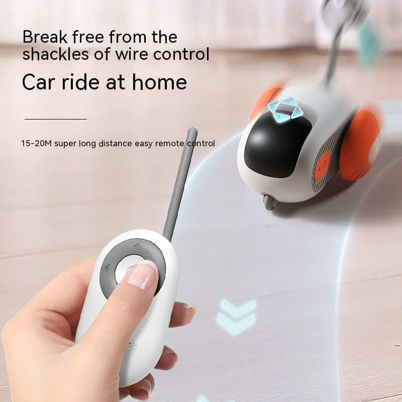 Hand holding a remote control with text about wireless control for car rides at home.