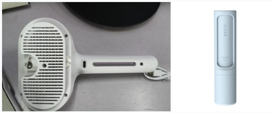Pet grooming tool with a handheld brush and a remote control on a gray surface.