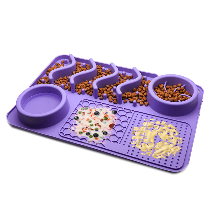 Purple pet feeding mat with multiple bowls and compartments on a white background