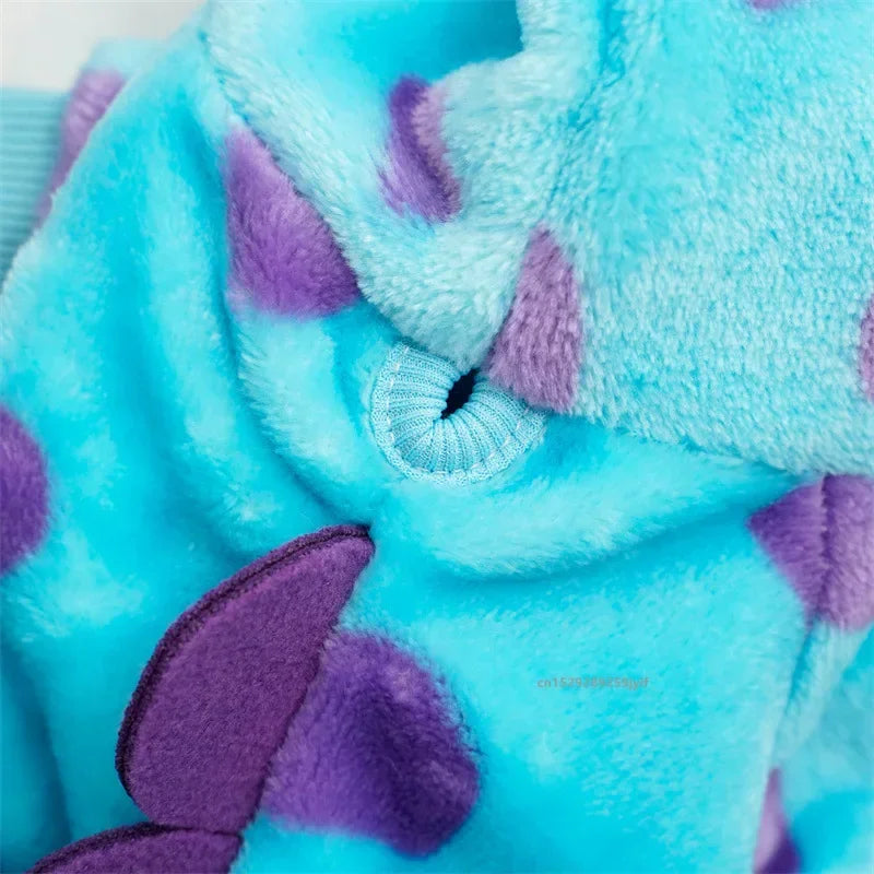 Close-up of a blue and purple textured fabric with floral patterns