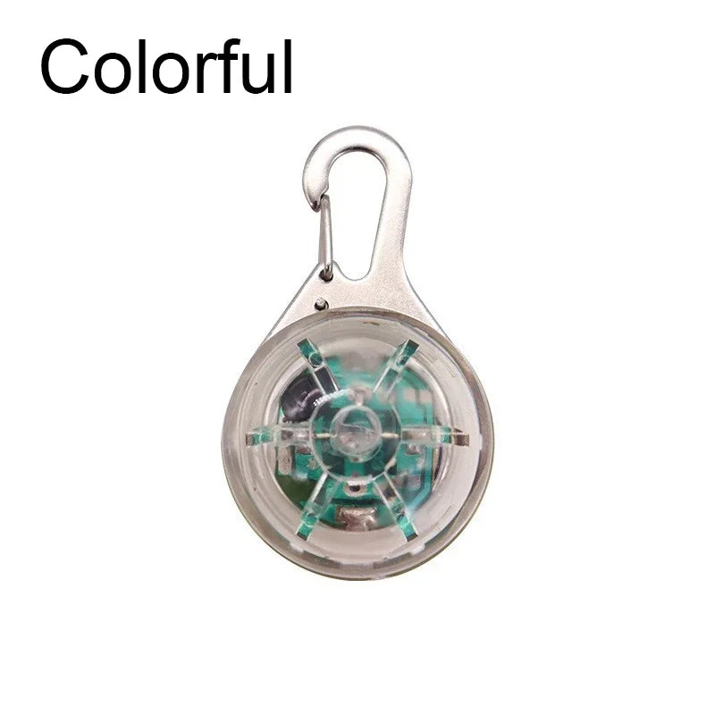 Fishing reel with a carabiner on a white background