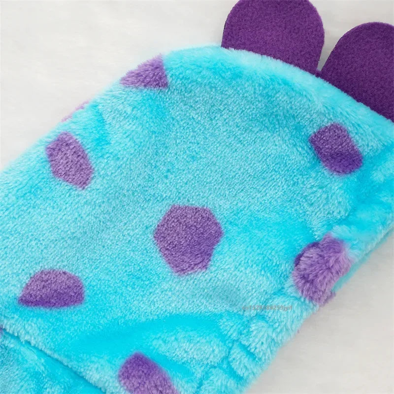 Blue towel with purple polka dots on a white background