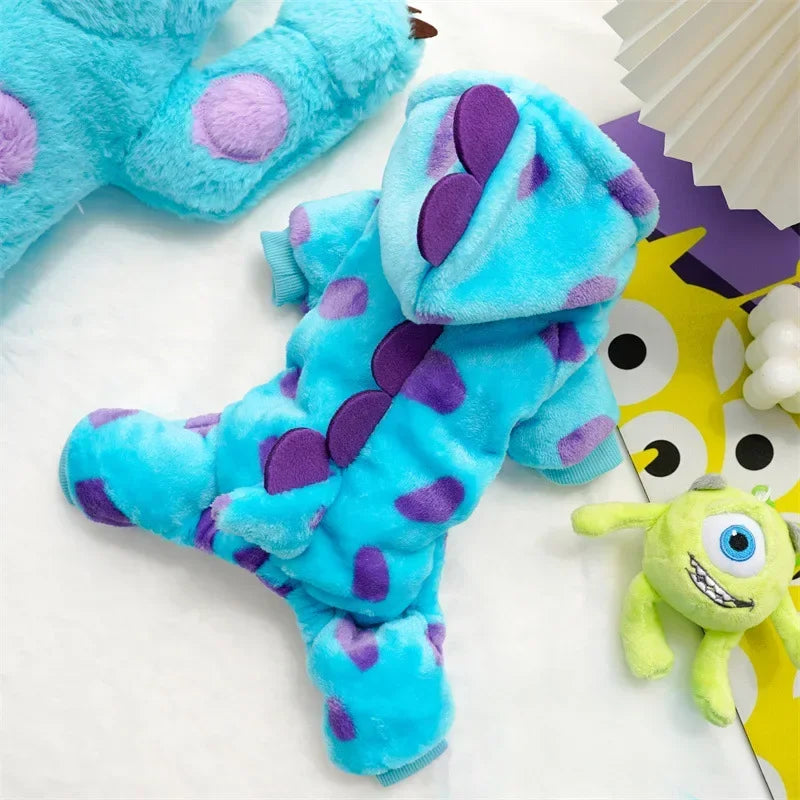 Blue and purple plush toy with purple spots on a white background