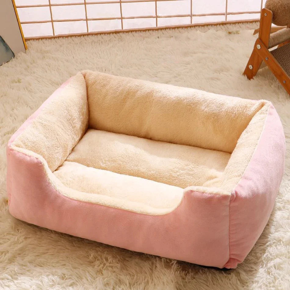 Pink and beige pet bed on a fluffy carpet